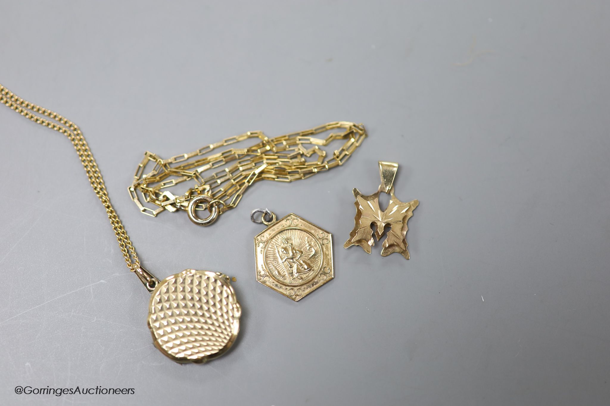 Two modern 9ct gold fine link chains, one with locket and two other 9ct gold pendants